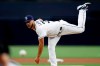 San Diego Padres starting pitcher Joey Lucchesi works against a Milwaukee Brewers batter during the first inning of a baseball game Monday, June 17, 2019, in San Diego. (AP Photo/Gregory Bull)
