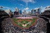 Players for the San Francisco Giants and the San Diego Padres stand during the singing of the national anthem before an opening day baseball game, Thursday, March 28, 2019, in San Diego. (AP Photo/Gregory Bull)