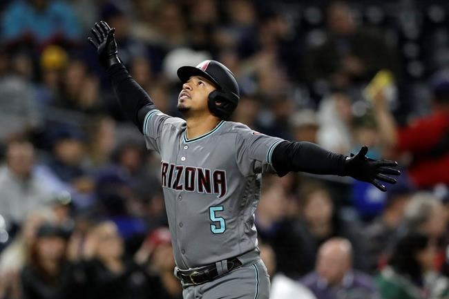 Arizona Diamondbacks' Eduardo Escobar looks up after hitting a home run during the fourth inning of a baseball game against the San Diego Padres, Tuesday, May 21, 2019, in San Diego. (AP Photo/Gregory Bull)