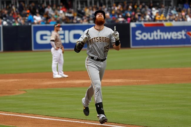 Pittsburgh Pirates' Colin Moran reacts after hitting a three-run home run during the first inning of a baseball game against the San Diego Padres, Sunday, May 19, 2019, in San Diego. (AP Photo/Gregory Bull)