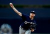 Milwaukee Brewers starting pitcher Brandon Woodruff works against a San Diego Padres batter during the first inning of a baseball game Tuesday, June 18, 2019, in San Diego. (AP Photo/Gregory Bull)