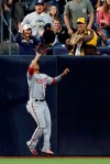 Washington Nationals left fielder Juan Soto makes the catch at the wall for the out on San Diego Padres' Josh Naylor during the second inning of a baseball game Friday, June 7, 2019, in San Diego. (AP Photo/Gregory Bull)