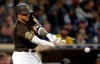San Diego Padres' Manny Machado breaks his bat as he hits into a double play during the third inning of the team's baseball game against the Pittsburgh Pirates, Friday, May 17, 2019, in San Diego. (AP Photo/Gregory Bull)