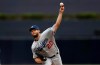 Los Angeles Dodgers starting pitcher Clayton Kershaw works against a San Diego Padres batter during the first inning of a baseball game Thursday, Sept. 26, 2019, in San Diego. (AP Photo/Gregory Bull)