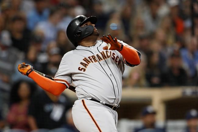 San Francisco Giants' Pablo Sandoval watches his RBI-double during the sixth inning of a baseball game against the San Diego Padres, Wednesday, July 3, 2019, in San Diego. (AP Photo/Gregory Bull)
