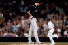 Colorado Rockies starting pitcher Jeff Hoffman, center, walks on the mound as San Diego Padres' Manny Machado, right, runs the bases after hitting a two-run home run during the sixth inning of a baseball game Saturday, Sept. 7, 2019, in San Diego. (AP Photo/Gregory Bull)