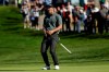 Adam Scott, of Australia, reacts as his putt for birdie just misses on the second hole of the South Course at Torrey Pines Golf Course during the final round of the Farmers Insurance golf tournament Sunday, Jan. 27, 2019, in San Diego. (AP Photo/Gregory Bull)