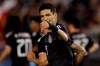 Mexico's Raul Jimenez celebrates after scoring a goal off a penalty kick during the second half of an international friendly soccer match against Chile, Friday, March 22, 2019, in San Diego. (AP Photo/Gregory Bull)