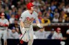 Philadelphia Phillies' Jay Bruce watches his grand slam during the fifth inning of the team's baseball game against the San Diego Padres, Tuesday, June 4, 2019, in San Diego. (AP Photo/Gregory Bull)