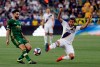 Portland Timbers midfielder Diego Valeri, left, shoots as Los Angeles Galaxy midfielder Jonathan dos Santos, right, defends during the first half of an MLS soccer match Sunday, March 31, 2019, in Carson, Calif. (AP Photo/Marcio Jose Sanchez)