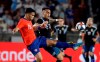 Chile's Sebastian Vegas, left, works against Argentina's Lautaro Martinez during the first half of an international friendly soccer match Thursday, Sept. 5, 2019, in Los Angeles. (AP Photo/Marcio Jose Sanchez)