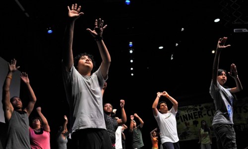 Mark J. Terrill / The Associated Press
This June 30, 2011 photo shows students rehearsing at the Mark Taper Inner-City Arts academy, in the Skid Row section of Los Angeles.