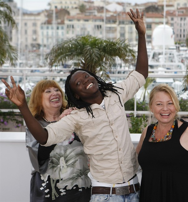 From left actors, Inge Maux, Peter Kazungu, and Margarethe Tiesl pose during a photo call for Paradise: Love at the 65th international film festival, in Cannes, southern France, Friday, May 18, 2012. (AP Photo/Lionel Cironneau)