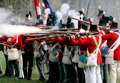 Dave Chidley / The Canadian Press Archives
Re-enactors portraying British soldiers fire their muskets in a restaging of a War of 1812 battle near an actual battle site west of London, Ont.