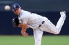 San Diego Padres starting pitcher Eric Lauer throws to a Washington Nationals batter during the first inning of a baseball game Saturday, June 8, 2019, in San Diego. (AP Photo/Orlando Ramirez)