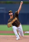 San Diego Padres starting pitcher Joey Lucchesi works against a San Francisco Giants batter during the first inning of a baseball game Friday, July 26, 2019, in San Diego. (AP Photo/Orlando Ramirez)