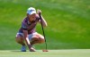 Stacy Lewis lines up a putt on the first green during the final round of the Kia Classic LPGA golf tournament, Sunday, March 31, 2019, in Carlsbad, Calif. (AP Photo/Orlando Ramirez)