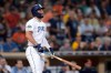 San Diego Padres' Eric Hosmer watches his two-run home run during the fourth inning of a baseball game against the Baltimore Orioles, Monday, July 29, 2019, in San Diego. (AP Photo/Orlando Ramirez)