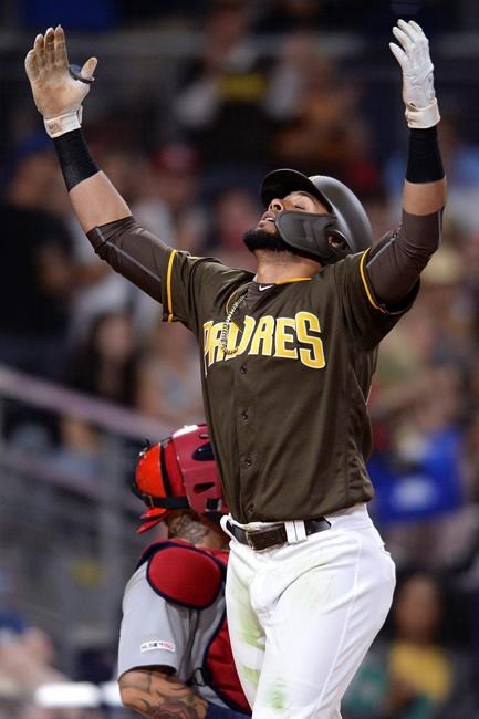 San Diego Padres' Fernando Tatis Jr. reacts after hitting a home run during the sixth inning of the team's baseball game against the St. Louis Cardinals on Friday, June 28, 2019, in San Diego. (AP Photo/Orlando Ramirez)