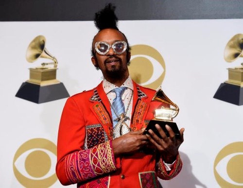 Fantastic Negrito poses in the press room with the award for best contemporary blues album for 