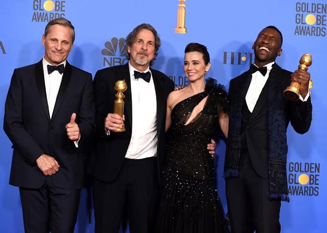 Viggo Mortensen, from left, Peter Farrelly, Linda Cardellini and Mahershala Ali, winner of the award for best performance by an actor in a supporting role in any motion picture for