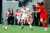 Belgium defender Heleen Jaques (4) grabs United States forward Carli Lloyd (10) during the first half of their international friendly soccer match Sunday, April 7, 2019, in Los Angeles. (AP Photo/Ringo H.W. Chiu)