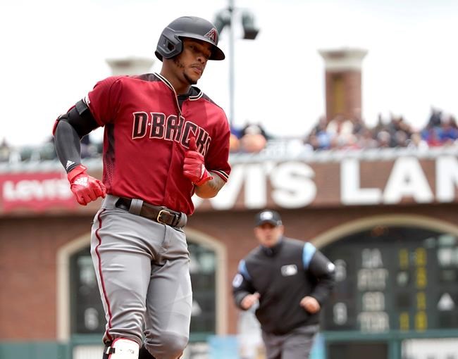 Arizona Diamondbacks' Ketel Marte rounds the bases after hitting a solo home run against the San Francisco Giants during the first inning of a baseball game in San Francisco, Sunday, May 26, 2019. (AP Photo/Tony Avelar)