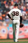 San Francisco Giants pitcher Tyler Beede holds his side after a throw against the Colorado Rockies during the fourth inning of a baseball game Thursday, Sept. 26, 2019, in San Francisco. Tyler Beede was taken out of the game. (AP Photo/Tony Avelar)