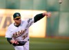 Oakland Athletics pitcher Brett Anderson (30) throws against the Cincinnati Reds in the first inning of a baseball game, Wednesday, May 8, 2019, in Oakland, Calif. (AP Photo/Tony Avelar)