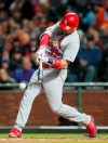 St. Louis Cardinals' Matt Wieters hits an RBI single against the San Francisco Giants during the fifth inning of a baseball game in San Francisco, Friday, July 5, 2019. (AP Photo/Tony Avelar)