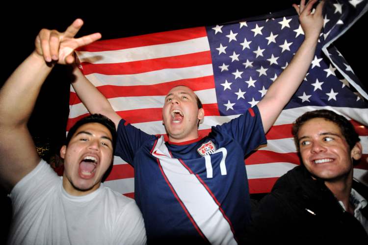Olivier Douliery / Abaca Press/MCT
People gather at the White House chanting 'U.S.A.' as U.S. President Barack Obama announces the death of Osama bin Laden during a late evening statement to the press, Sunday, May 1, 2011 in Washington, D.C.