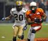 Arlen Redekop / Postmedia News
BC Lions Arland Bruce (right) runs for a touchdown, trailed by Winnipeg Blue Bombers Deon Beasley during second-half action of the 2011 Grey Cup final between the Winnipeg Blue Bombers and the BC Lions in Vancouver November 27, 2011.