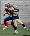 PAUL CHIASSON / THE CANADIAN PRESS ARCHIVES
Bombers defensive back Arrington Hicks latches onto Alouettes receiver Eric Deslauriers in pre-season action June 16.
