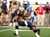 Paul Chiasson / The Canadian Press
Winnipeg Blue Bombers quarterback Buck Pierce is sacked by Montreal Alouettes linebacker Mike Edem during first quarter Thursday in Montreal.