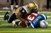 Paul Chiasson / THE CANADIAN PRES
The Bombers defence had Als QB Anthony Calvillo eating turf sandwiches seven times -- including this sack by Bryant Turner -- holding the Hall of Famer to 121 yards passing.