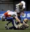 Darryl Dyck / The Canadian Press
Nick Moore, 17, back, had seven catches for 99 yards in last week’s victory against B.C. but a foot injury means he will miss this week's game in Hamilton.