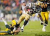 JIMMY JEONG / THE CANADIAN PRESS
Blue Bombers’ running back Fred Reid runs the ball past Edmonton’s Mark Restelli for a touchdown during the second half on Thursday.