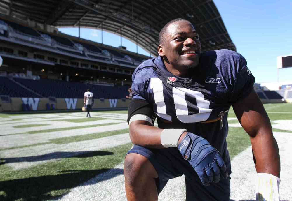 RUTH BONNEVILLE / WINNIPEG FREE PRESS FILES
Winnipeg Blue Bomber, Henoc Muamba, talks to the media after Bomber practice Sept 04,, 2013.