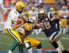 CP
Winnipeg Blue Bombers' Joe Lobendahn rushes in for the sack on Edmonton Eskimos' Ricky Ray in second half CFL action in Winnipeg, Friday, August 5, 2011.