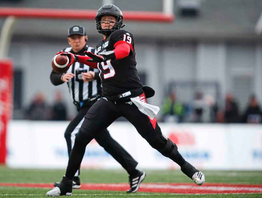 JEFF MCINTOSH / THE CANADIAN PRESS
Calgary Stampeders quarterback Bo Levi Mitchell prepares to throw the ball during first-half CFL West Division final football game action against the Winnipeg Blue Bombers in Calgary, Alberta, Sunday, Nov. 18, 2018.