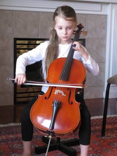 Six-year-old Luka Coetze practices her cello at her teacher's home in Calgary on Friday, Oct. 21, 2011. The child prodigy started taking lessons when she was one and was to perform at Mount Royal University on Sunday. THE CANADIA PRESS/Bill Graveland