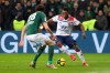 Lyon's Moussa Dembele, right, challenges for the ball with Saint-Etienne's Neven Subotic, left, during their French League One soccer match in Saint-Etienne, central France, Sunday, Jan. 20, 2019. (AP Photo/Laurent Cipriani)