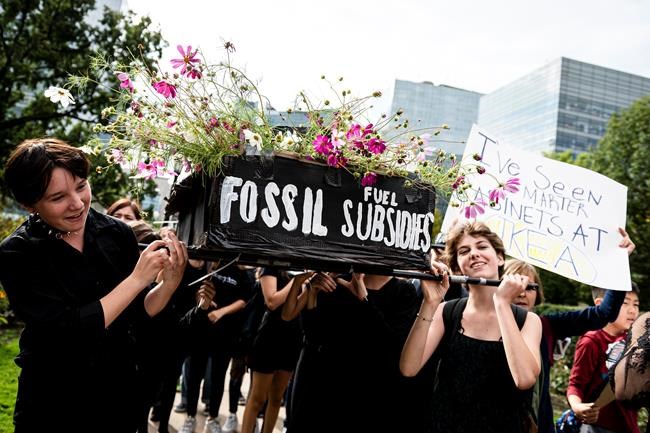 Young people gather at a climate change protest in Toronto on Friday, Sept. 27, 2019. THE CANADIAN PRESS/Christopher Katsarov