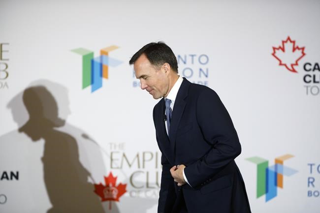 Canadian finance minister Bill Morneau leaves the stage following an armchair discussion hosted by the Toronto Region Board of Trade, The Empire Club and Canadian Club of Toronto, in Toronto, Wednesday, March 20, 2019. THE CANADIAN PRESS/Cole Burston