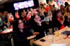 Tennis fans Julie Lobendino, left, and Miani Delacruz react as they watch the opening set of the US Open Championship match at a viewing party hosted by Tennis Canada in Toronto, Saturday, Sept. 7, 2019, to show support for Canadian Bianca Andreescu. THE CANADIAN PRESS/Cole Burston