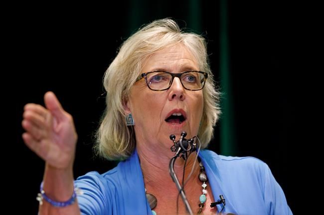 Green Party of Canada leader Elizabeth May, left, speaks with Toronto area candidate Annamie Paul during a fireside chat about the climate, in Toronto, Tuesday, Sept. 3, 2019. THE CANADIAN PRESS/Cole Burston