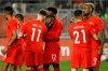 Canada defender Doneil Henry, centre left, celebrates with teammates midfielder Liam Millar (11) and midfielder Alphonso Davies (12) as he celebrates a goal during second half of CONCACAF Nations League play at BMO Field in Toronto, Saturday, Sept. 7, 2019. After thumping Cuba 6-0 in Toronto on Saturday, Canada looks to finish the job as the two teams meet again in CONCACAF Nations League A play Tuesday in a game shifted to the capital of the Cayman Islands when the stadium in Havana did not pass CONCACAF scrutiny. THE CANADIAN PRESS/Cole Burston