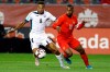 Canada forward Junior Hoilett (10) and Cuba midfielder Alejandro Portal (8) battle for the ball during second half of Concacaf Nations League play at BMO Field in Toronto, Saturday, Sept. 7, 2019. THE CANADIAN PRESS/Cole Burston