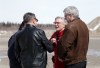 Indigenous Affairs Minister Carolyn Bennett is greeted at the Attawapiskat airport by Chief Bruce Shisheesh on Monday, April 18, 2016, as NDP MP Charlie Angus (right) looks on. The remote First Nations community in northern Ontario has been hit hard by youth attempts at suicide. THE CANADIAN PRESS/Colin Perkel