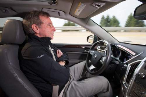 Postmedia 
General Motors staff researcher Jeremy Salinger demonstrates a prototype SRX with self-driving technologies that aim to control the vehicle’s speed and steering in free-moving traffic and stop-and-go conditions.